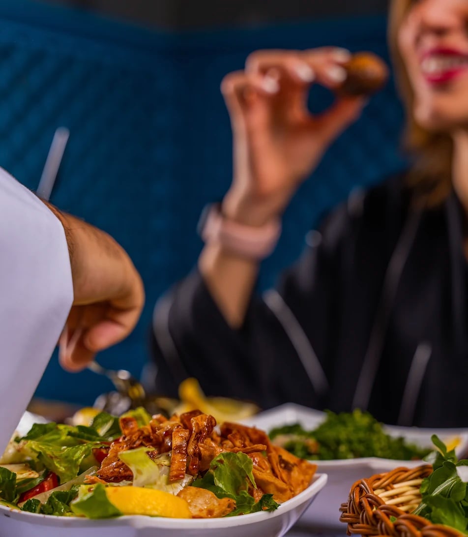 Guest enjoying a colourful salad in a restaurant