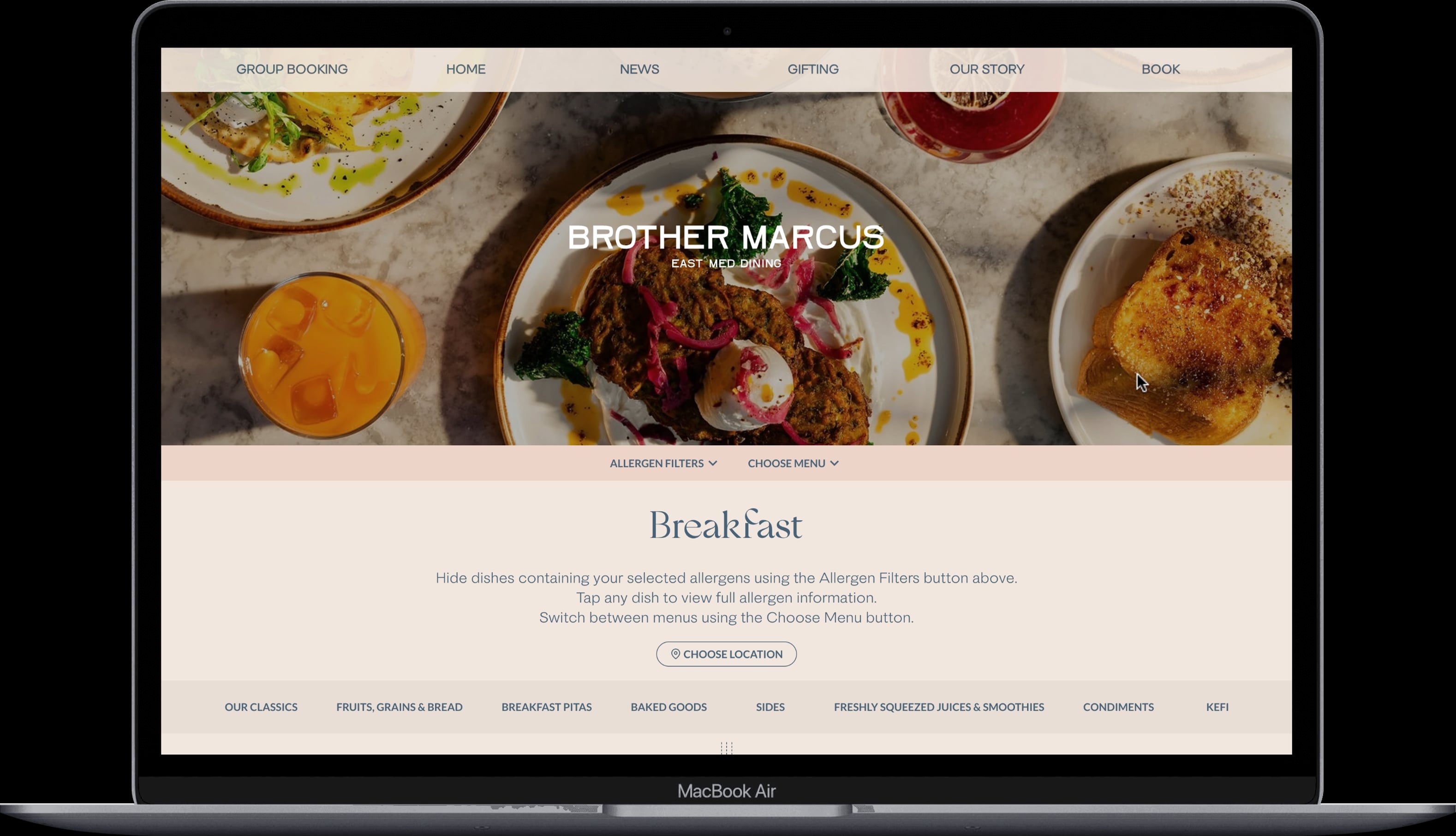 Published restaurant menu shown on a laptop