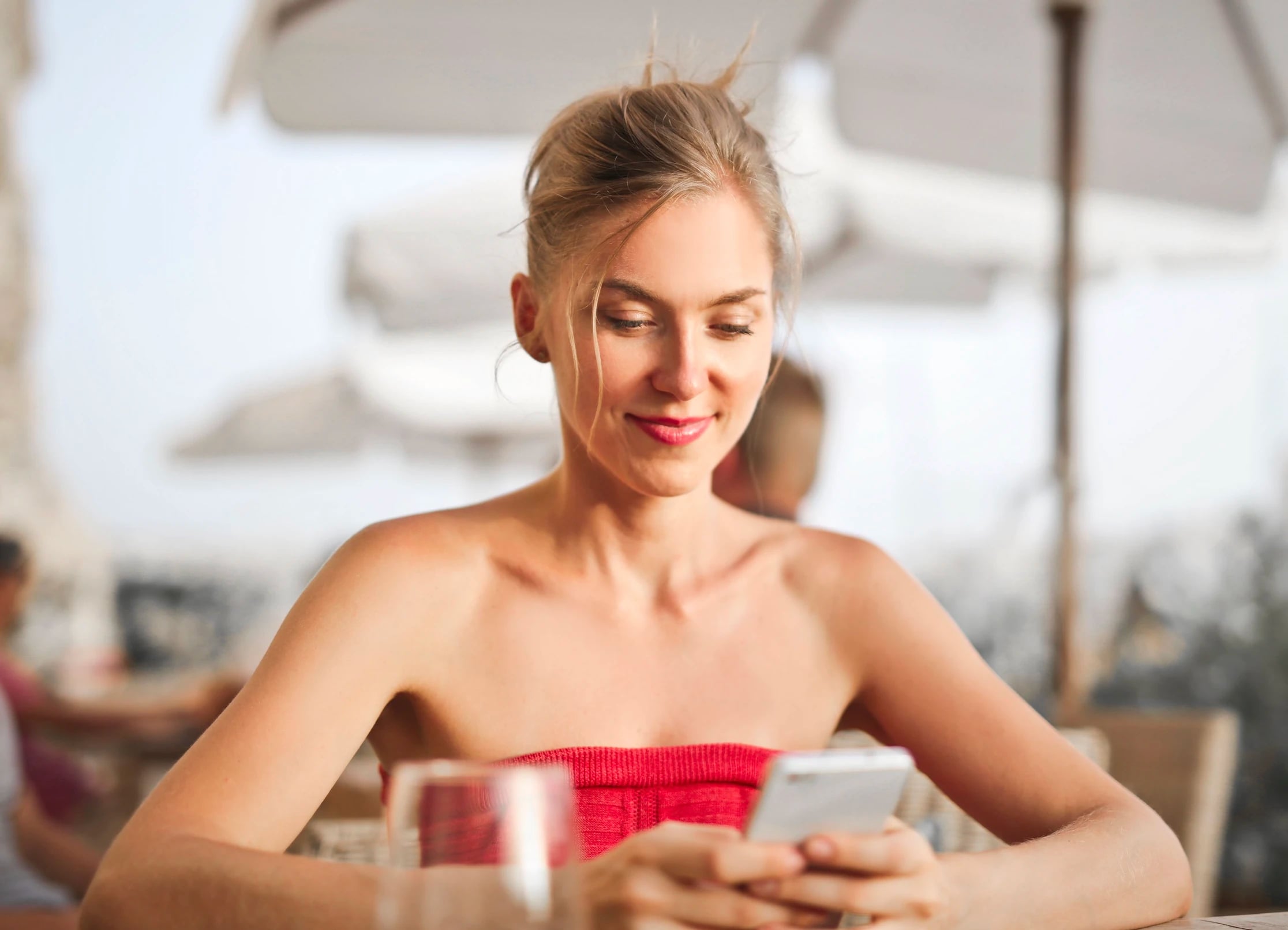 Guest using a phone in a hospitality setting